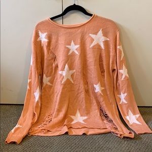 Star ripped sweater